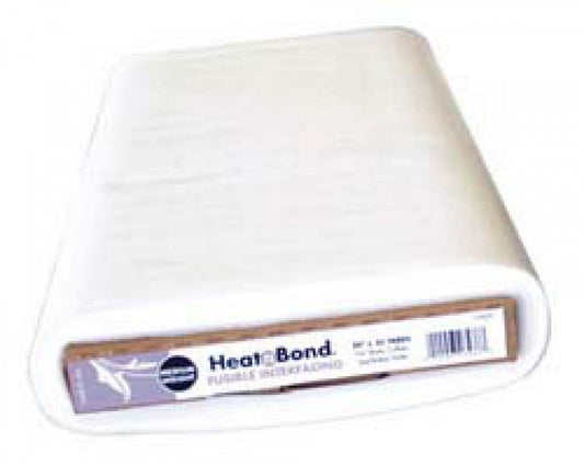 A folded white or off-white fabric panel with a Heat-Bond paper label along one edge, photographed on a plain white background.
Photo by ThermOWeb [image_link]