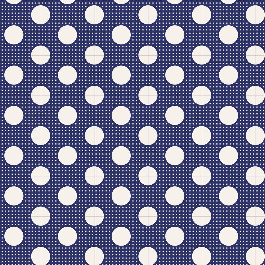 Pattern of white circles on a navy blue background.
Photo by Tildafabrics.com [image_link]