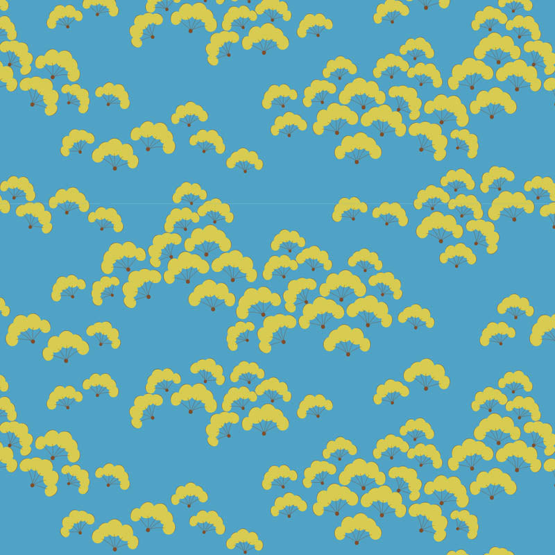 Fabric with yellow leaf pattern on a blue background.
Photo by Tildafabrics.com [additional_image_link]