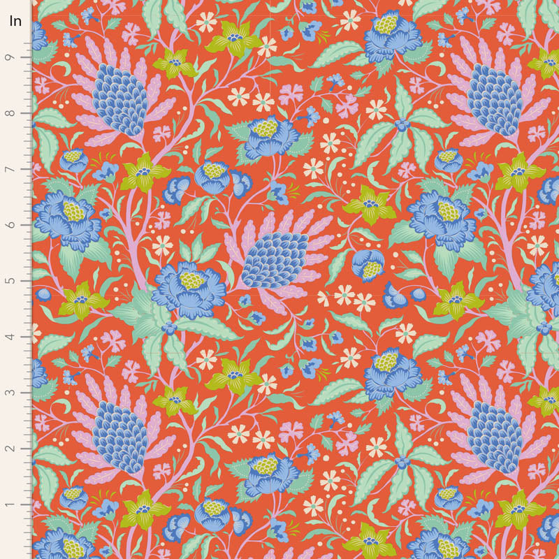 A remnant piece of fabric featuring a floral pattern with a mix of orange, blue, and green colors on a persimmon background.
Photo by Tildafabrics.com [image_link]