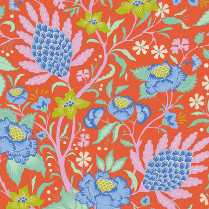 A remnant piece of fabric featuring a floral pattern with a mix of orange, blue, and green colors on a persimmon background.
Photo by Tildafabrics.com [additional_image_link]