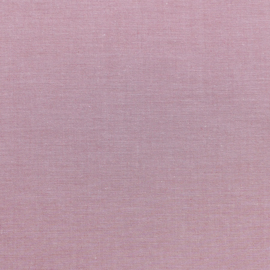 A solid pink colored fabric swatch from the Chambray Basics collection.
Photo by Tildafabrics.com [image_link]