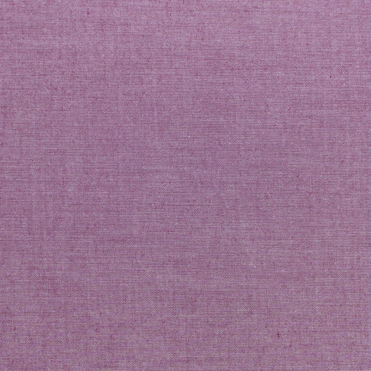 A Chambray Basics Plum fabric with a solid purple color and a visible textured weave.
Photo by Tildafabrics.com [image_link]
