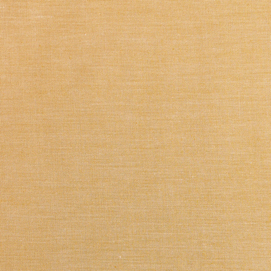 A small section of a yellow chambray fabric from the Tilda Chambray Basics collection, showing the texture and weave.
Photo by Tildafabrics.com [image_link]