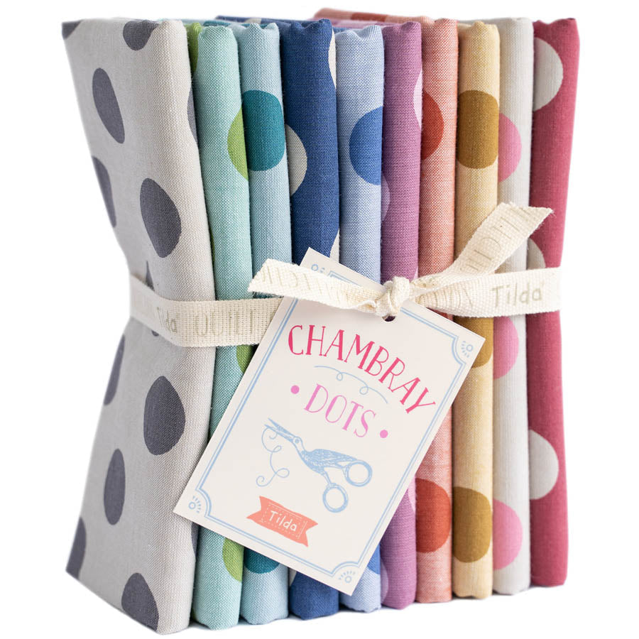 Set of colorful fabric swatches with a 'Chambray Dots' tag on a white background.
Photo by Tildafabrics.com [additional_image_link]