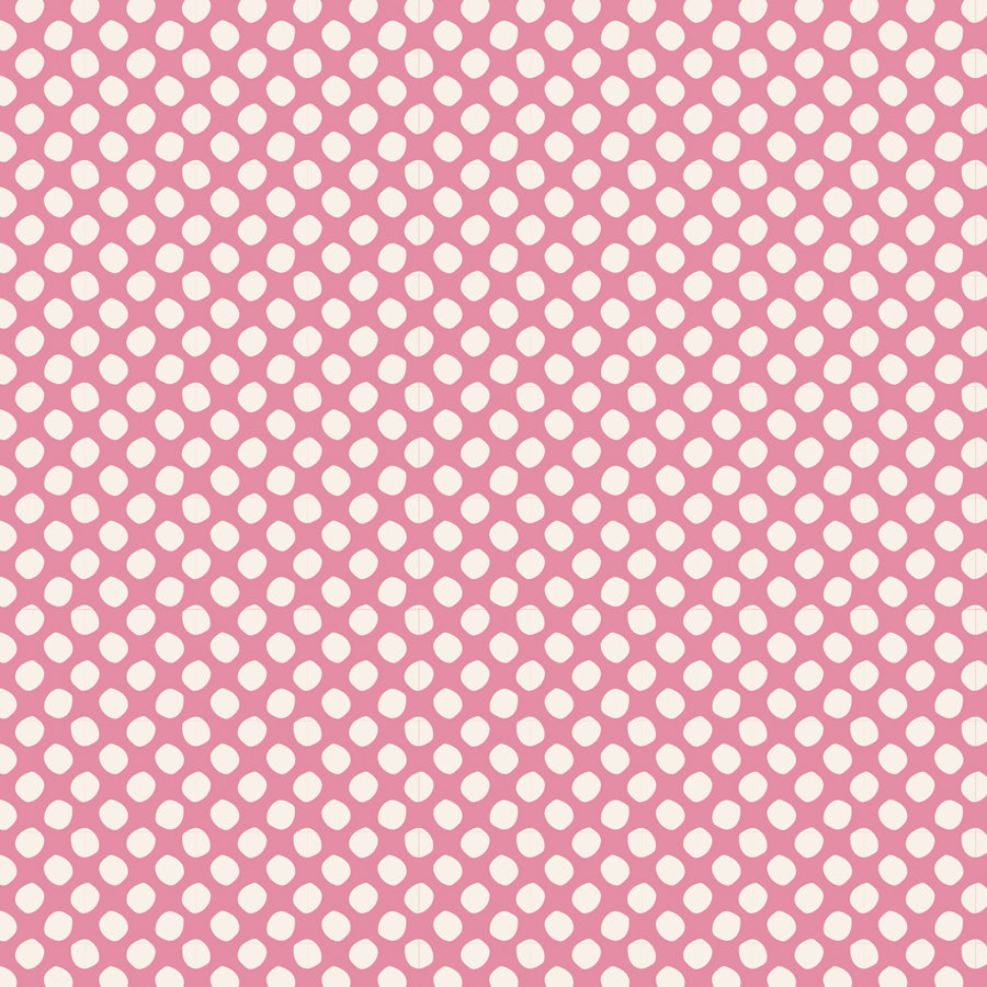 A repeating pattern of small white oval dots on a pink background.
Photo by Tildafabrics.com [image_link]