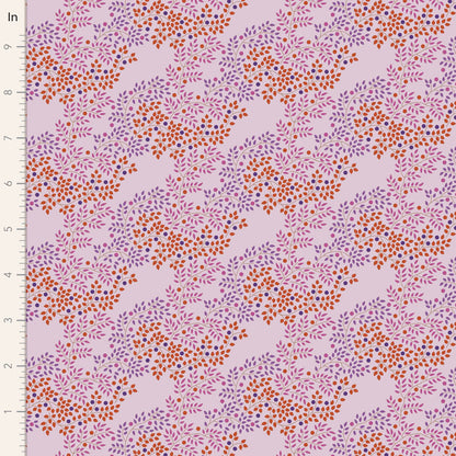 A purple fabric from the Tilda Hometown Berrytangle Plum collection, featuring a floral pattern with orange and red berries on a plum background.
Photo by Tildafabrics.com [image_link]