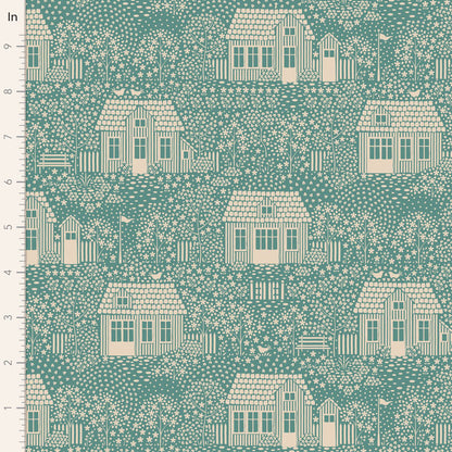 A repeating fabric pattern showing cream-colored cottages, trees, and flowers on a teal background, with a ruler scale along the left edge marked in inches.
Photo by Tildafabrics.com [image_link]