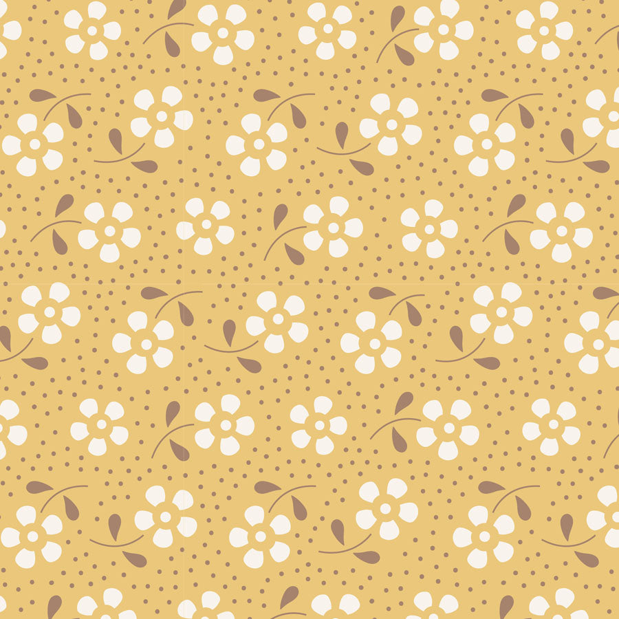 A repeating floral pattern on a warm mustard-yellow background, featuring small white flowers with brown centers and stems, plus scattered brown dots across the surface.
Photo by Tildafabrics.com [image_link]