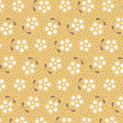 A repeating floral pattern on a warm mustard-yellow background, featuring small white flowers with brown centers and stems, plus scattered brown dots across the surface.
Photo by Tildafabrics.com [image_link]