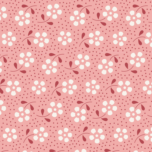 A repeating floral pattern on a dusty pink background, featuring white flower clusters with dark red centers and stems, plus small dark red dots throughout.
Photo by Tildafabrics.com [image_link]