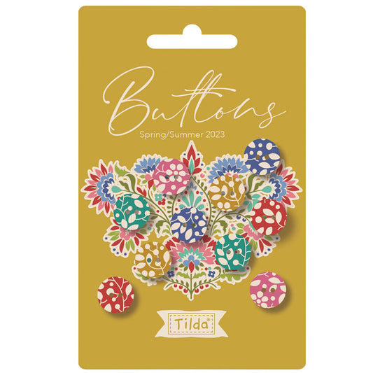Packaging of Tilda floral buttons with a yellow background.
Photo by Tildafabrics.com [image_link]