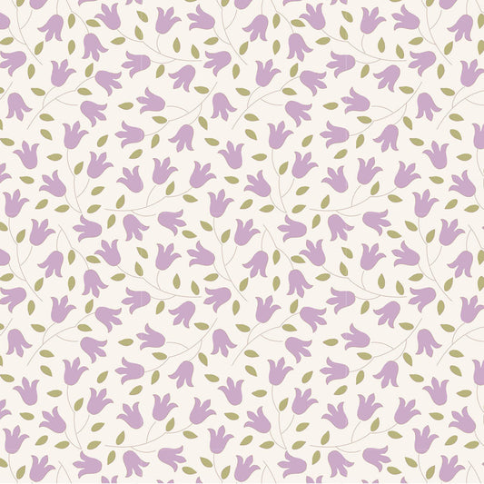 A repeating floral pattern featuring light purple bell-shaped flowers and small olive-green leaves on a warm off-white background.
Photo by Tildafabrics.com [image_link]
