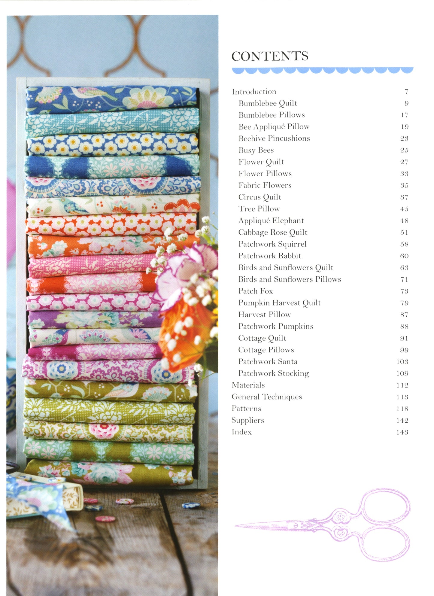 Stack of colorful fabric rolls with a table and chair in the background, next to a table of fabric pieces.
Photo by Tildafabrics.com [additional_image_link]