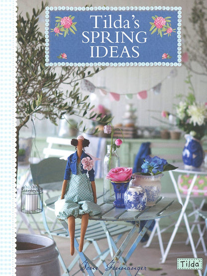 Book cover of 'Tilda's Spring Ideas' with a doll and spring decor elements.
Photo by Tildafabrics.com [additional_image_link]