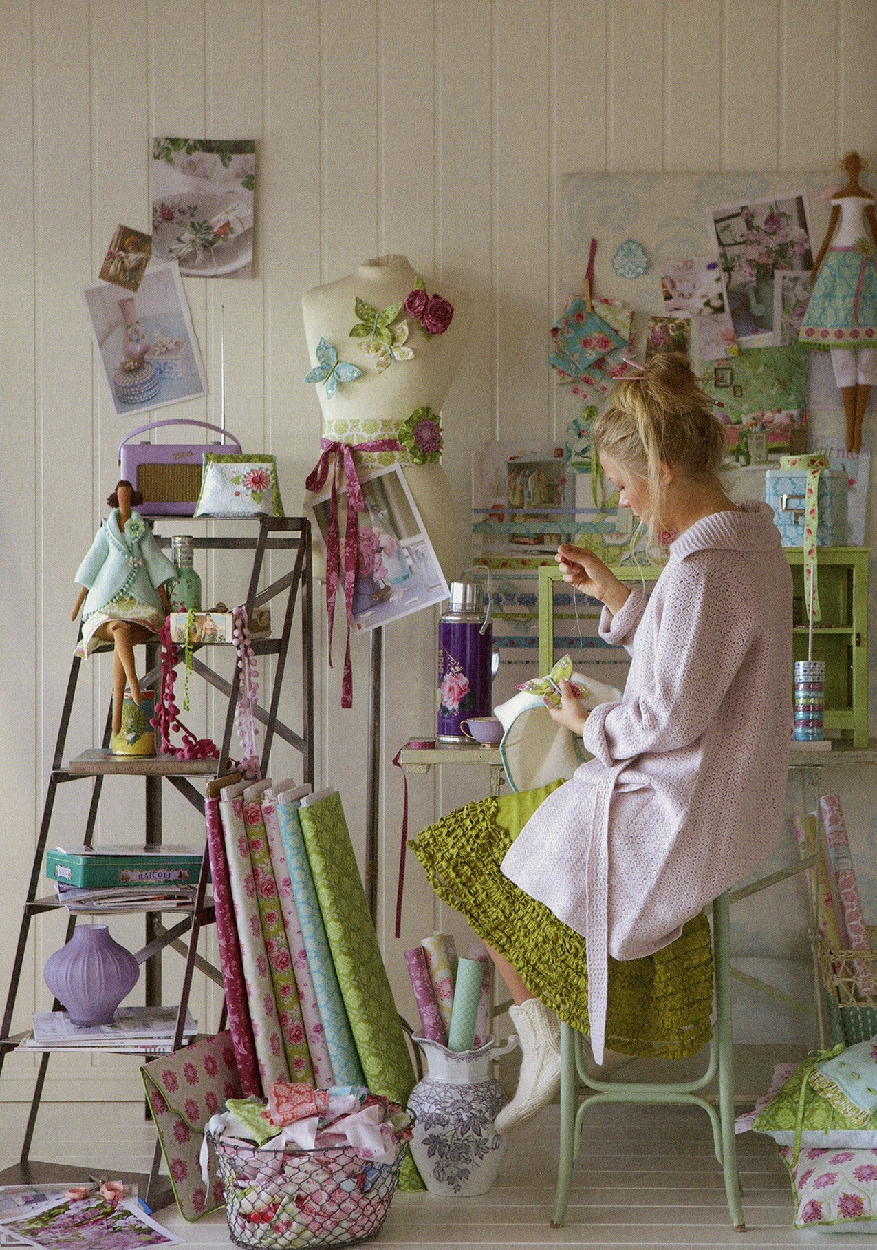 Woman in a craft room surrounded by materials and decorations
Photo by Tildafabrics.com [additional_image_link]