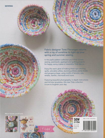 A collection of handmade fabric basketweave bowls in various sizes, decorated with colorful patterned fabric.
Photo by Tildafabrics.com [additional_image_link]