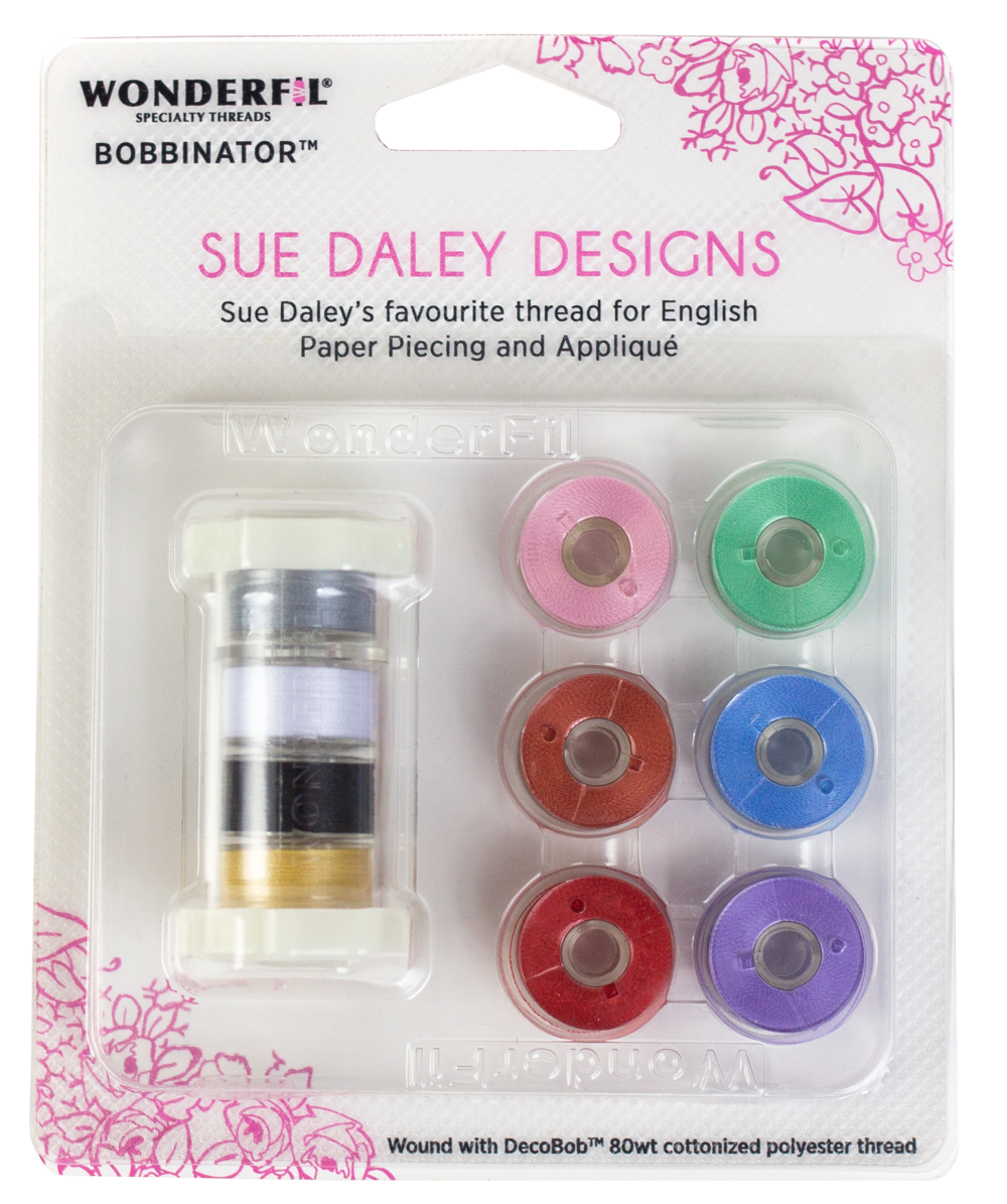 Packaging of Sue Daley WONDERFIL BOBBINATOR Thread Class 15 Bobbins in various colors, showing the product with 10 prewound bobbins and the brand's name.
Photo by Wonderfil [additional_image_link]