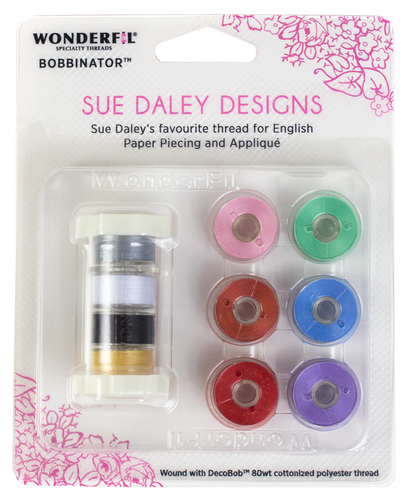 Packaging of Sue Daley WONDERFIL BOBBINATOR Thread Class 15 Bobbins in various colors, showing the product with 10 prewound bobbins and the brand's name.
Photo by Wonderfil [additional_image_link]