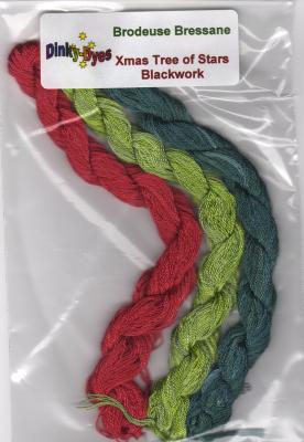 Three braided brossane embroidery threads in red, light green, and dark teal, packaged in a clear plastic bag with a white label reading 'Brodeuse Bressane Xmas Tree of Stars Blackwork' and the Pinkfloy brand.
Photo by Dinky Dyes [additional_image_link]